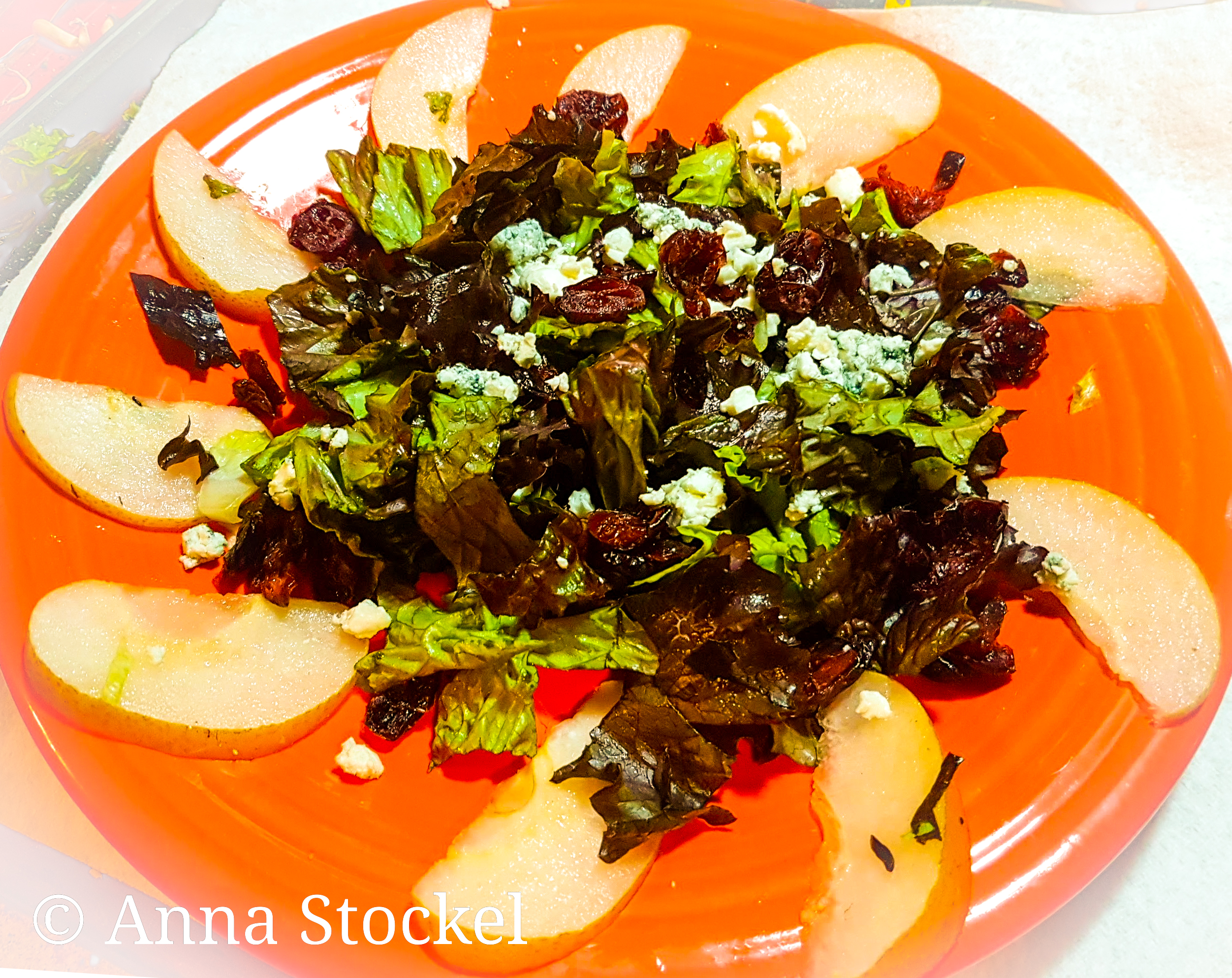 Pear and Red Leaf Lettuce Salad with Walnuts, Dried Cranberries, and Blue Cheese image
